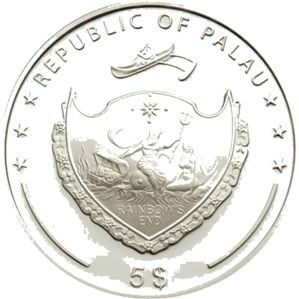 Ovenfor ses bagsiden af sølvmønten med en pålydende værdi på 5 Palauiske dollars. Palau har i øvrigt en ret speciel historie, idet man efter 34 år under amerikansk styre i 1978 løsrev sig fra USA's Mikronesien. Øerne i Mikronesien blev af USA brugt til militære formål. Derfor lavede Palau en forfatning, som forbød atomvåben i landet. Landet blev selvstændigt i 1981, hvorefter den amerikanske regering så en interesse i på ny at have militære aktiviteter på Palau, men den foreslåede aftale stred imod Palaus forfatning. Et flertal af befolkningen ville gerne have aftalen, men en slækning af forfatningens bestemmelser ville kræve minimum 75 % af stemmerne. Efter 8 år og hele 9 folkeafstemninger blev aftalen indgået den 1. oktober 1994, men det skyldtes kun, at forfatningen var blevet ændret. Palaus nye status er herefter at være en fri stat i associering med USA, og aftalen, som gælder i 50 år, indebærer store økonomisk fordele for Palau